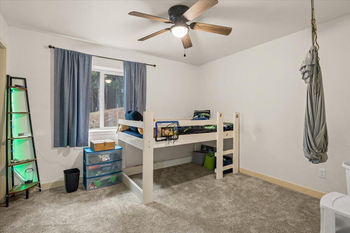 350 Splendor Drive Wilderville, OR 97543 - Photo 35 of 57 a room with furniture and a window