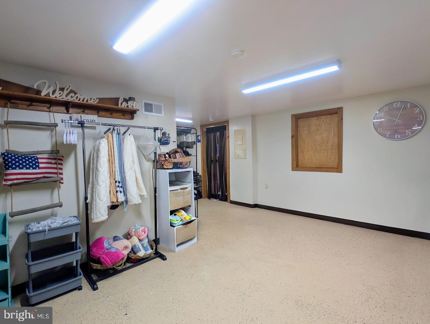 1030 Sandy Run Road Hopewell, PA 16650 - Photo 24 of 28 a view of walk in closet with clothes and shoes