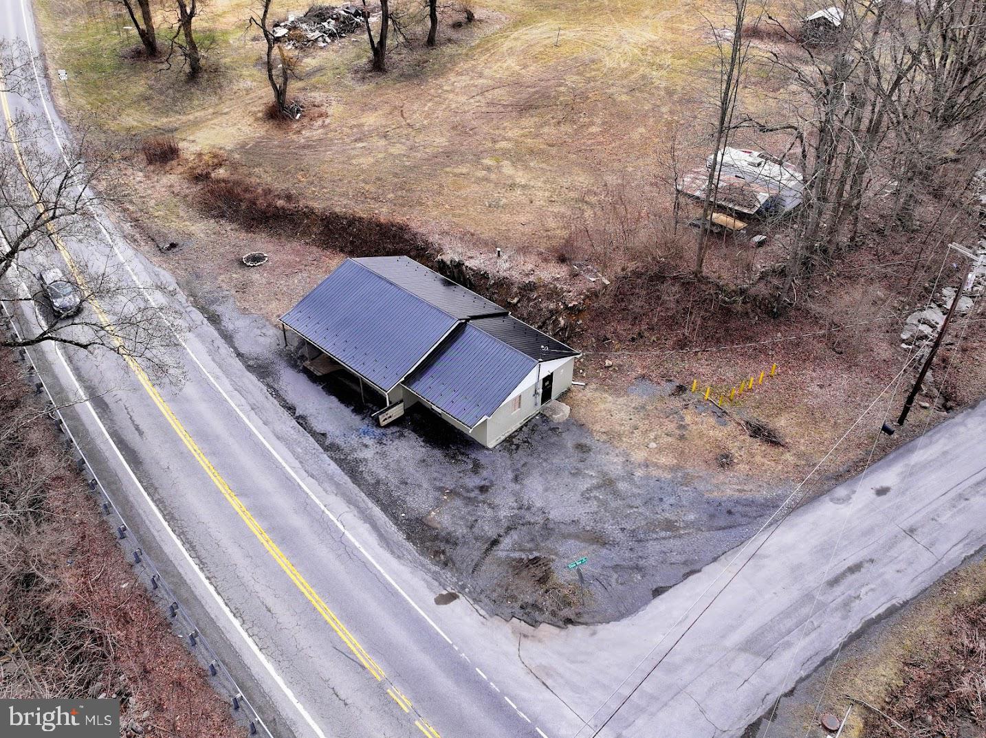 1030 Sandy Run Road Hopewell, PA 16650 - Photo 28 of 28 a view of a backyard with wooden fence
