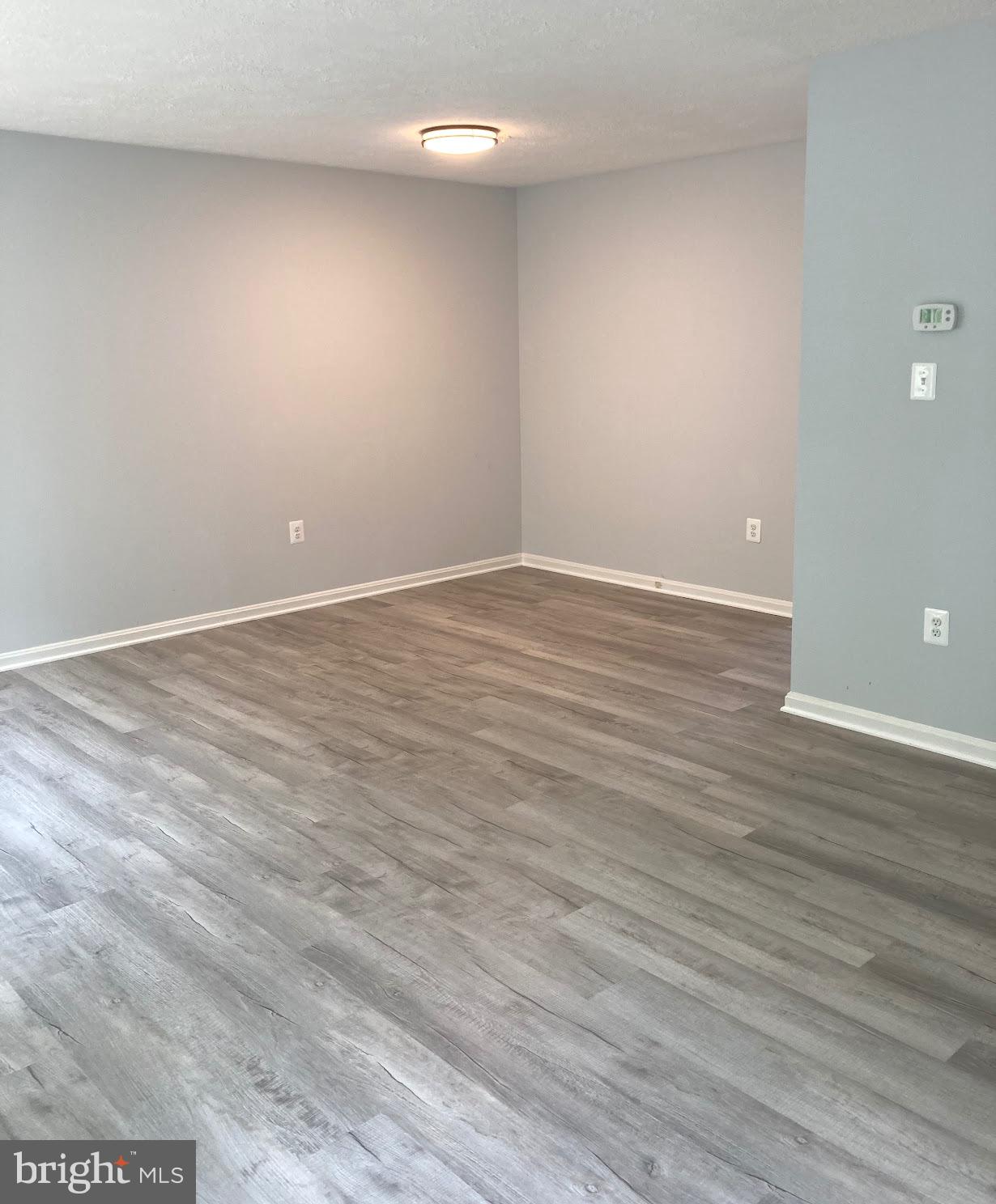 5775 Springfish Place Waldorf, MD 20603 - Photo 16 of 51 New LVP flooring, new fresh paint, new lighting