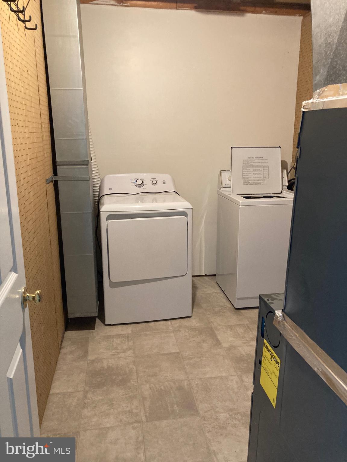 5775 Springfish Place Waldorf, MD 20603 - Photo 34 of 51 Laundry room with new flooring