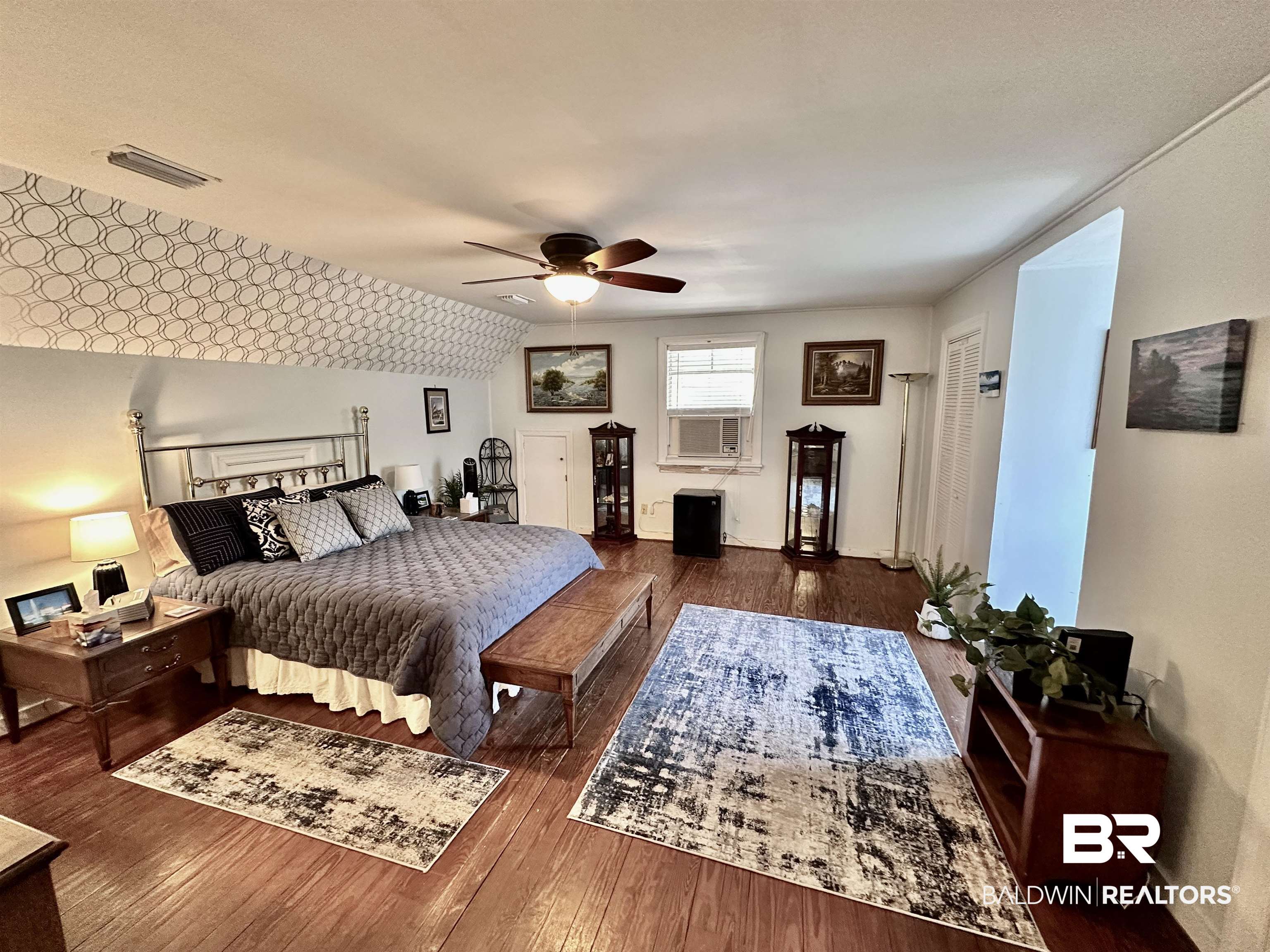 260 Siena Vista Street Mobile, AL 36607 - Photo 27 of 41 Bedroom featuring hardwood / wood-style flooring, baseboards, a ceiling fan, and cooling unit