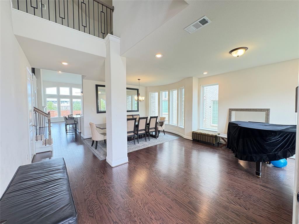 323 Butternut Way Irving, TX 75063 - Photo 4 of 32 a living room with furniture and a wooden floor