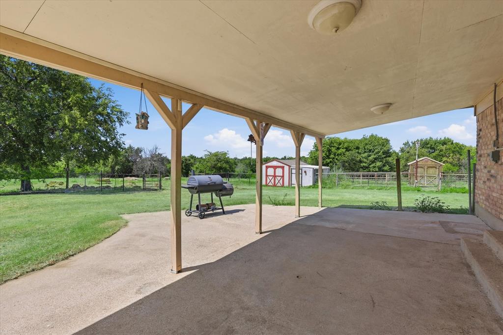 892 Highland Circle Springtown, TX 76082 - Photo 27 of 40 Huge covered patio.