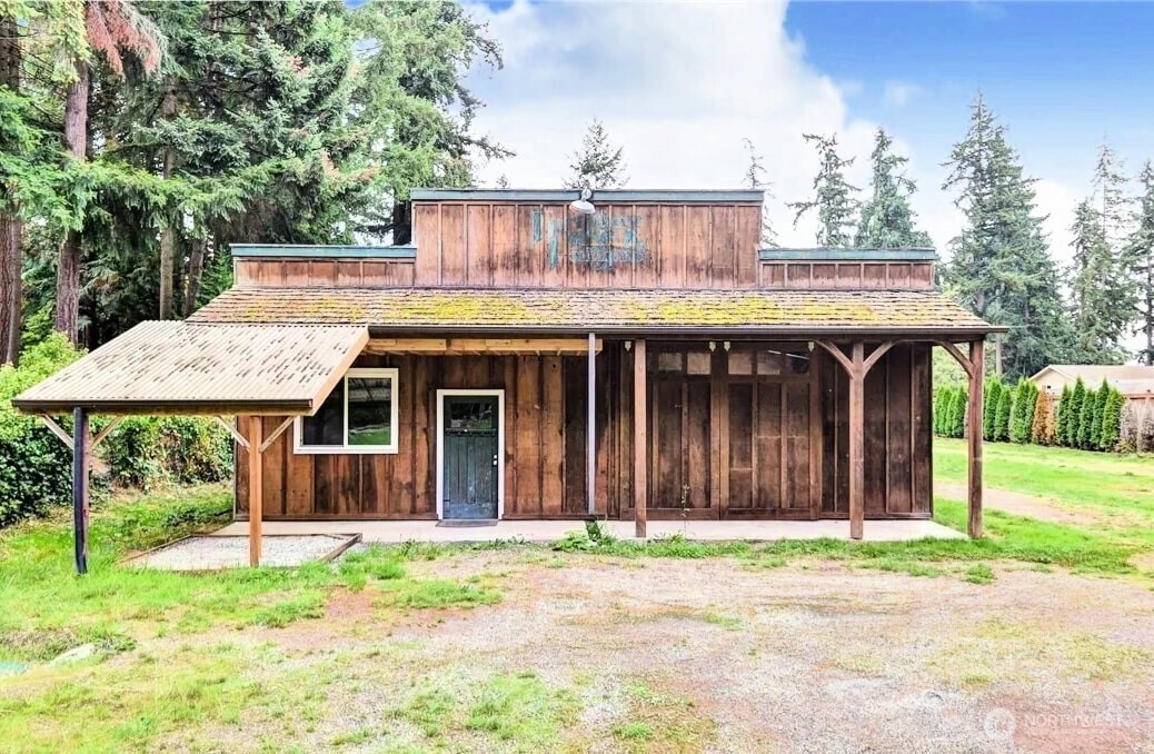 23507 49th Avenue Southeast Bothell, WA 98021 - Photo 1 of 1 a front view of a house with a porch