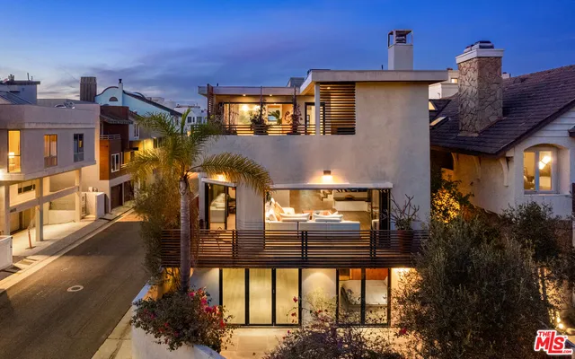 a view of a house with parking area