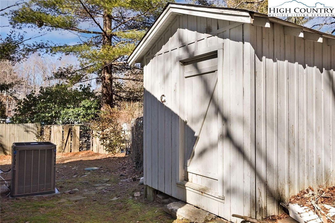 1670 Highway 194 Boone, NC 28607 - Photo 25 of 30 a view of backyard with wooden fence and large trees