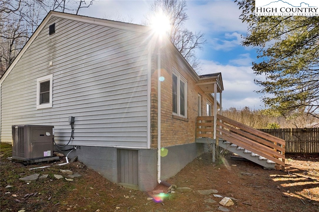 1670 Highway 194 Boone, NC 28607 - Photo 26 of 30 a front view of a house with a yard