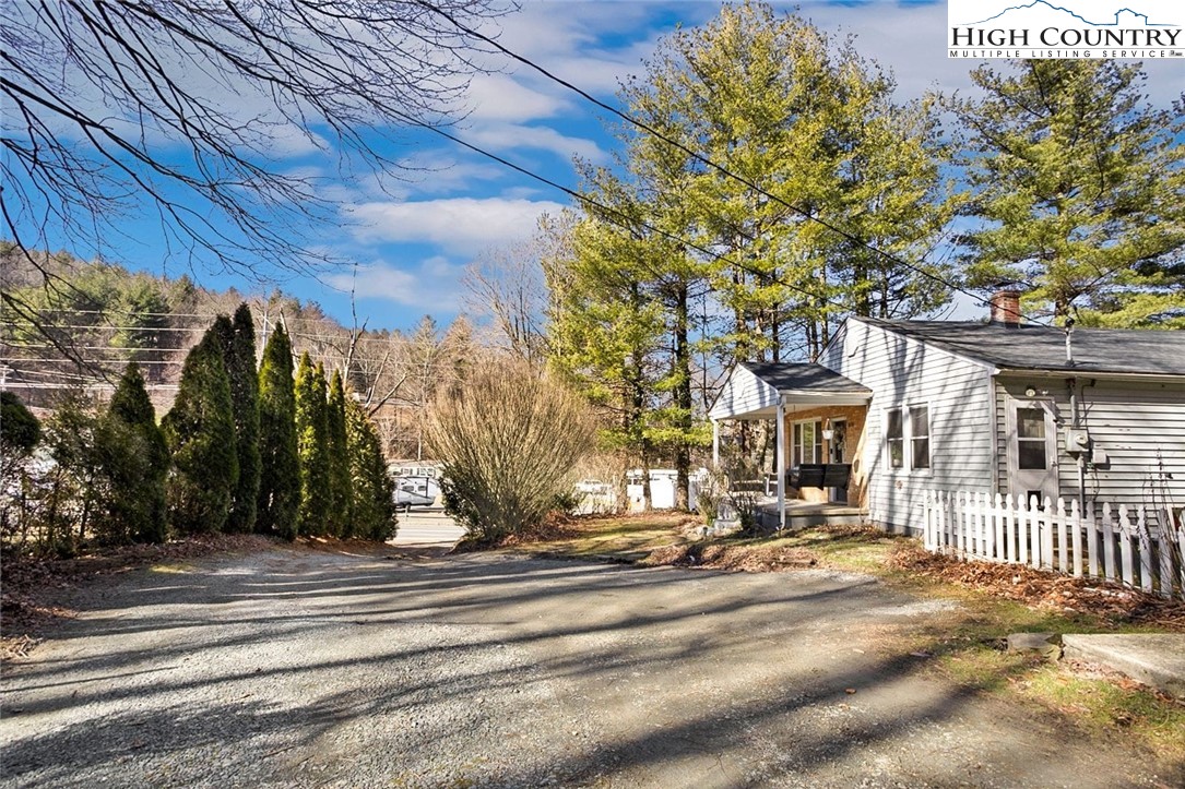 1670 Highway 194 Boone, NC 28607 - Photo 29 of 30 a view of a house with a yard