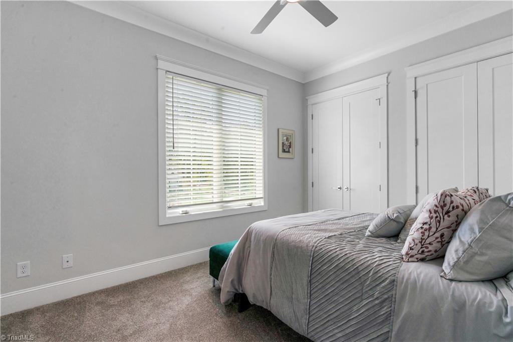 6844 Shields Drive Oak Ridge, NC 27310 - Photo 24 of 49 Main level secondary bedroom