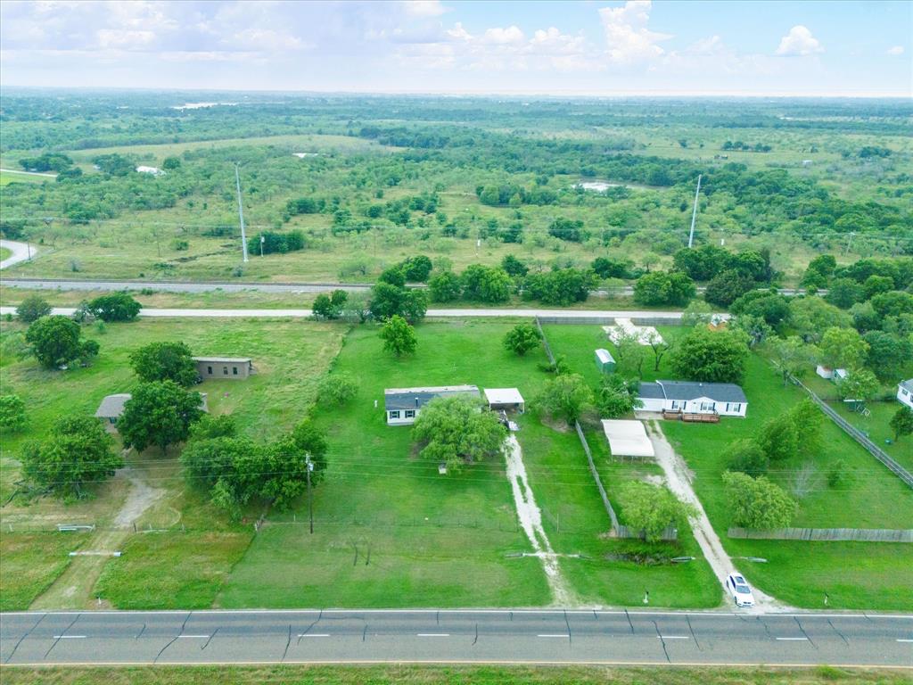 7311 South Interstate 45 Service Road Alma, TX 75119 - Photo 4 of 7 a view of a big yard