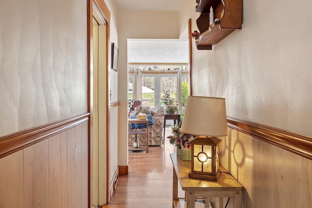 346 Townsend Road Groton, MA 01450 - Photo 13 of 43 a view of a chairs and table in a balcony