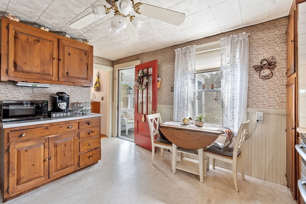 346 Townsend Road Groton, MA 01450 - Photo 14 of 43 a dining room with stainless steel appliances granite countertop furniture and a window