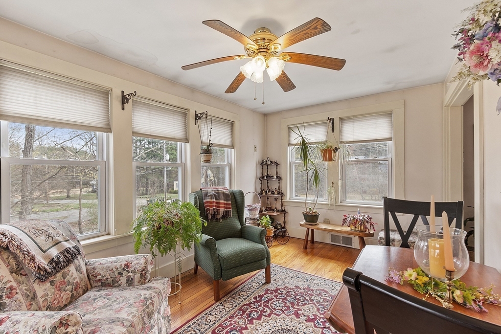 346 Townsend Road Groton, MA 01450 - Photo 19 of 43 a living room with furniture and a large window