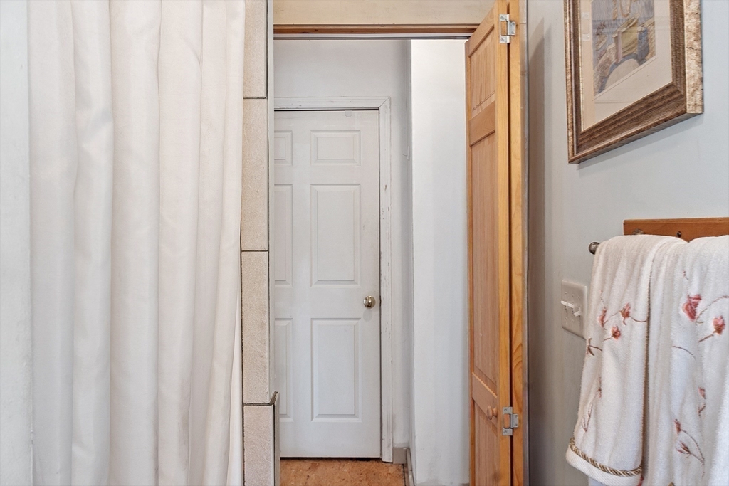 346 Townsend Road Groton, MA 01450 - Photo 26 of 43 a bathroom with a shower and a curtain