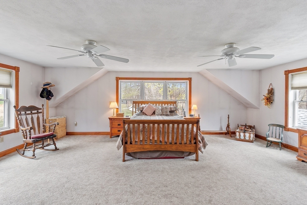 346 Townsend Road Groton, MA 01450 - Photo 27 of 43 a bedroom with furniture and a window