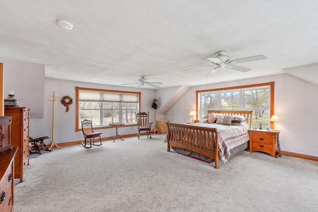 346 Townsend Road Groton, MA 01450 - Photo 30 of 43 a bedroom with furniture and a window