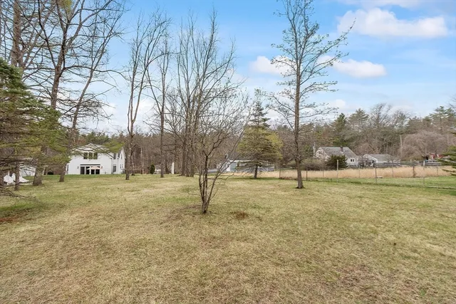 a picture of a bench in front of a window