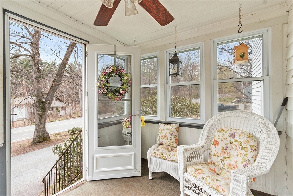 346 Townsend Road Groton, MA 01450 - Photo 5 of 43 a living room with furniture and a large window
