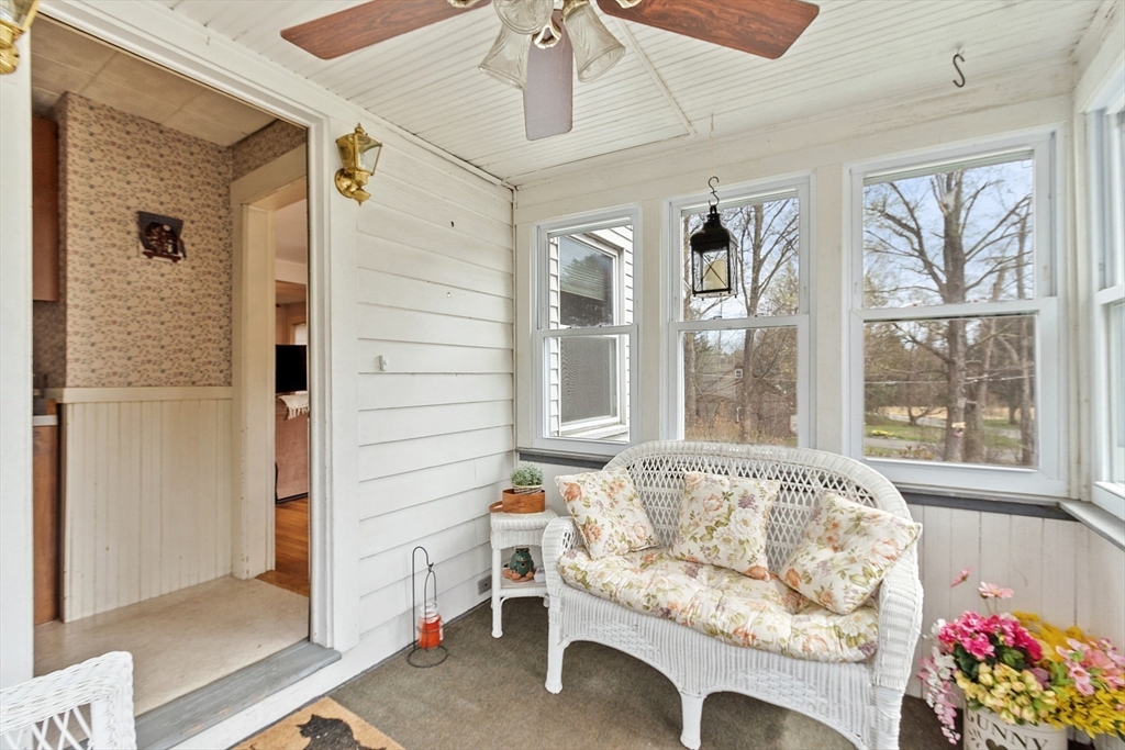 346 Townsend Road Groton, MA 01450 - Photo 6 of 43 a living room with furniture and a large window