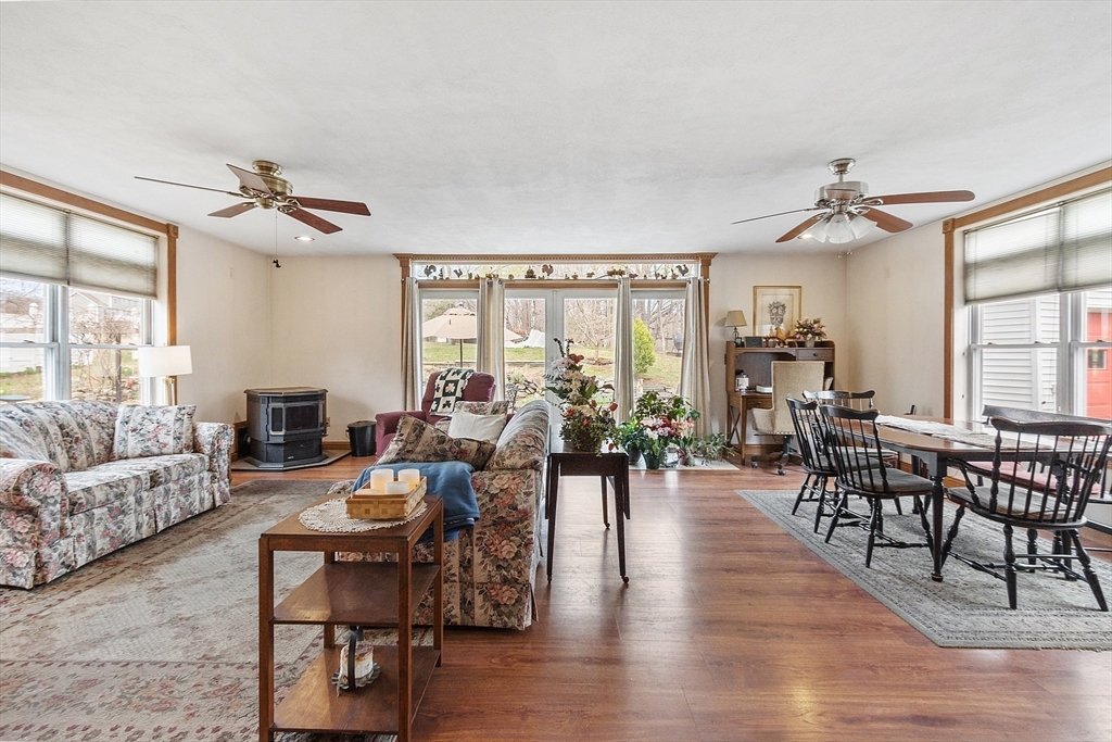 346 Townsend Road Groton, MA 01450 - Photo 7 of 43 a living room with furniture dining area and a large window