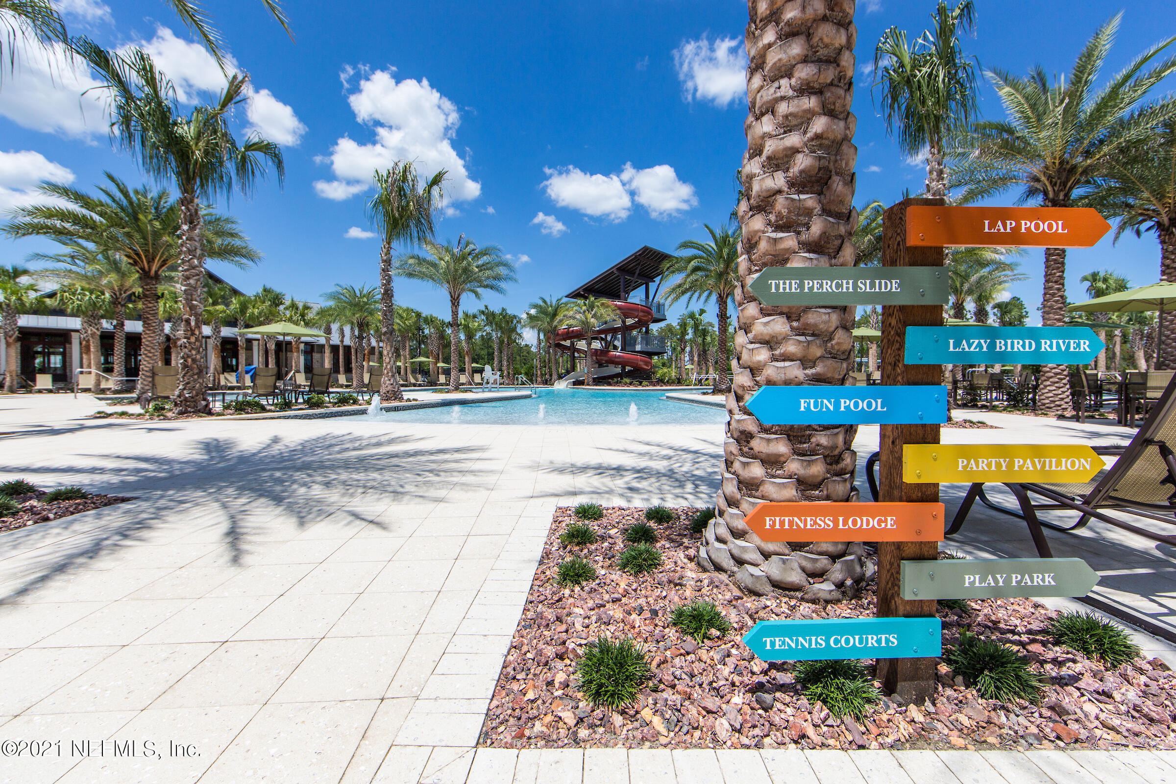 1035 Windley Drive St. Augustine, FL 32092 - Photo 31 of 69 a view of a swimming pool with a lounge chairs