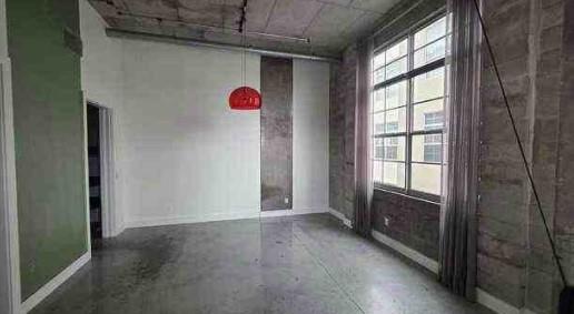 444 Northwest 1st Avenue, Unit 502 Fort Lauderdale, FL 33301 - Photo 6 of 10 a view of an empty room with a window