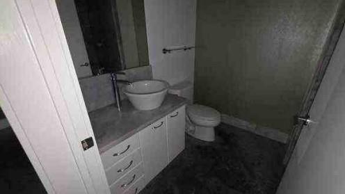 444 Northwest 1st Avenue, Unit 502 Fort Lauderdale, FL 33301 - Photo 10 of 10 a bathroom with a sink and toilet