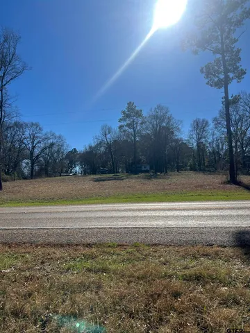 a view of a swimming pool and an outdoor space