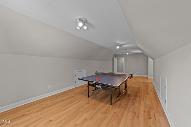 a room with furniture and wooden floor