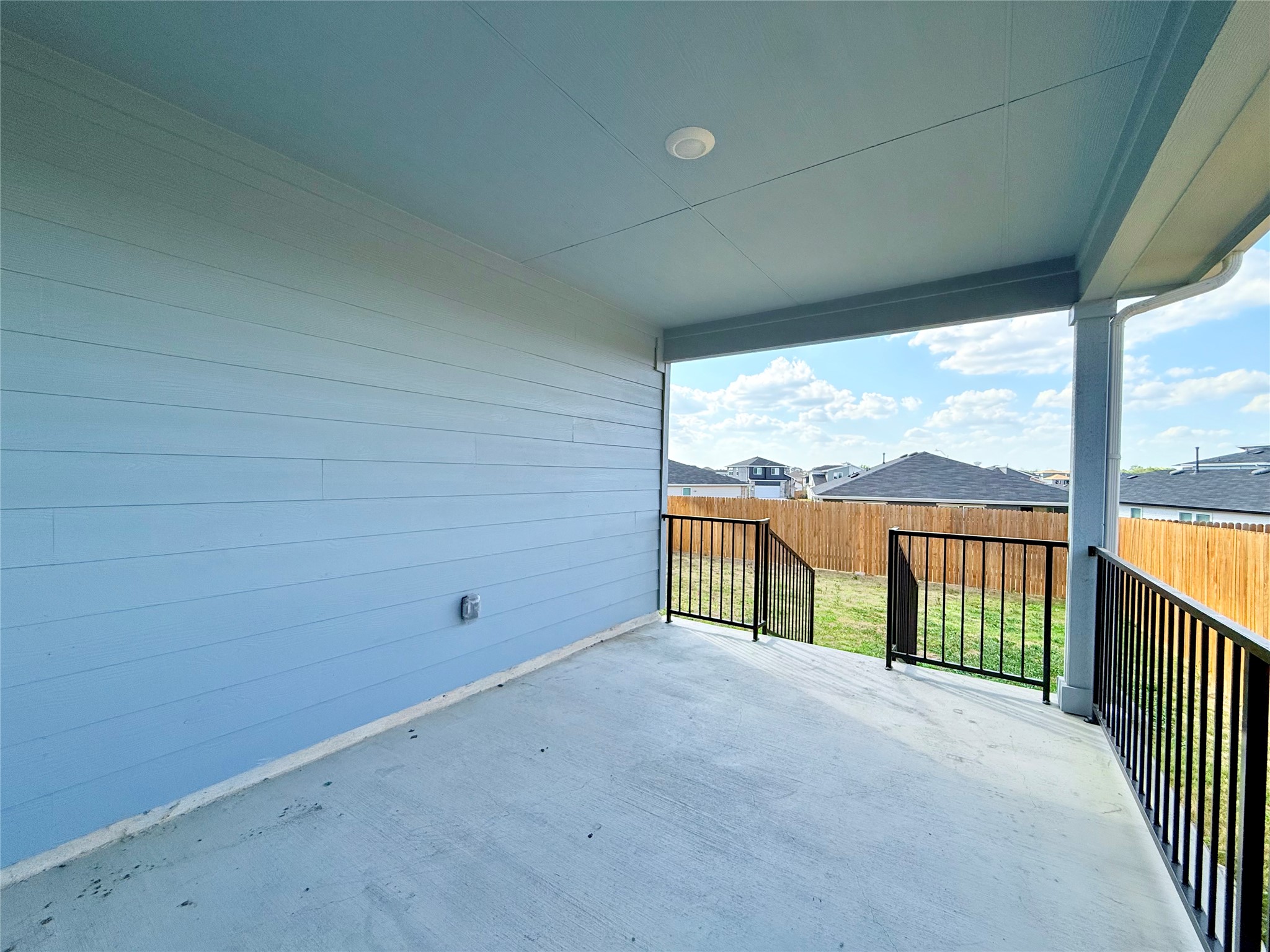 598 Gladiola Loop Kyle, TX 78640 - Photo 32 of 33 Fenced backyard with a patio