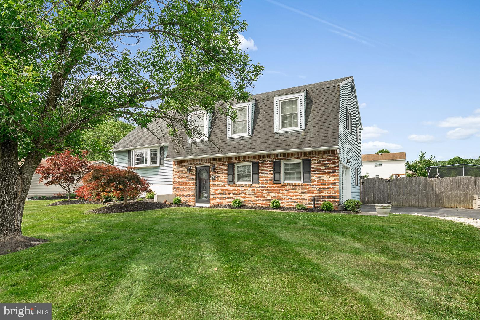 8 Valley Road Hamilton, NJ 08690 - Photo 2 of 31 a front view of a house with a garden