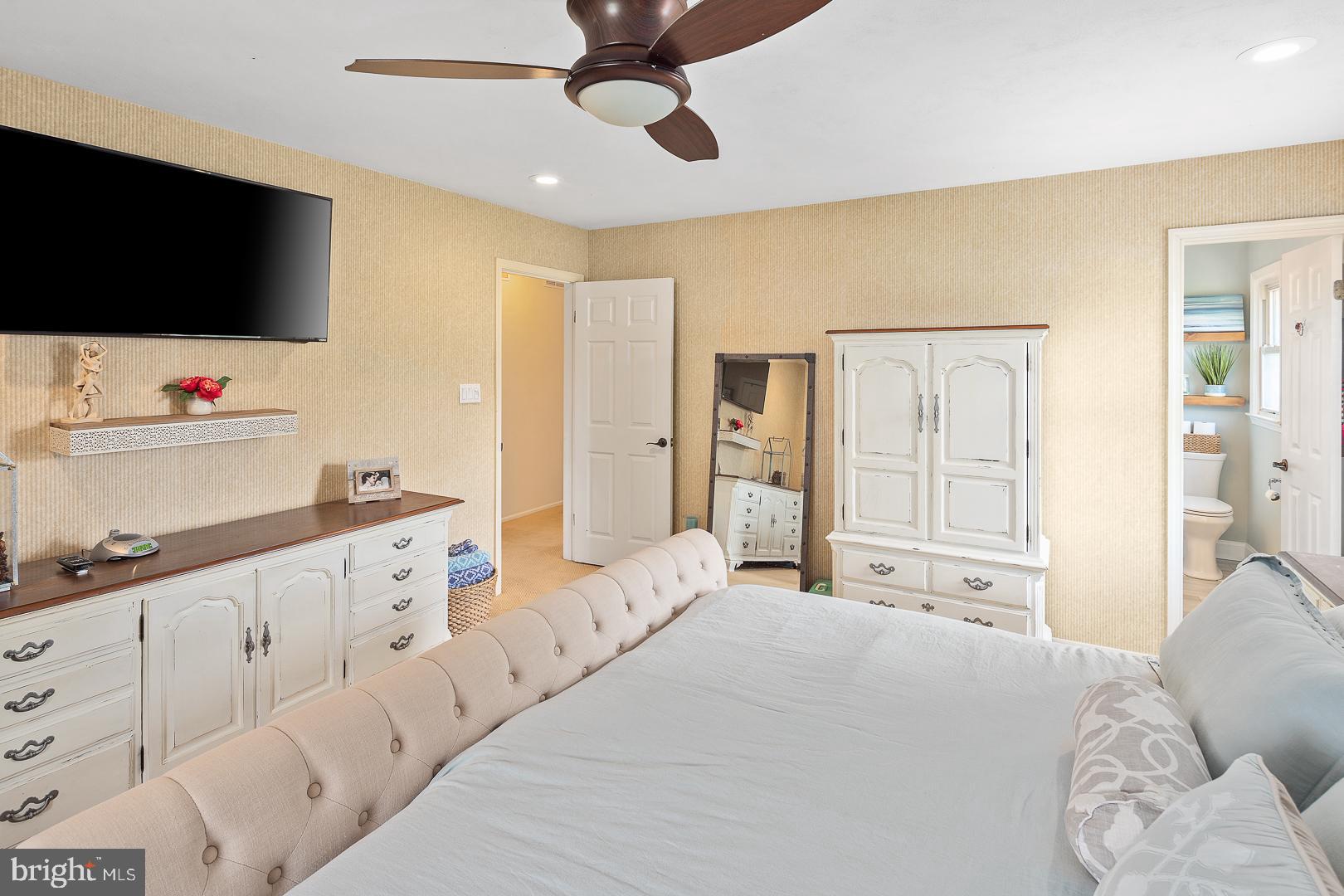 8 Valley Road Hamilton, NJ 08690 - Photo 15 of 31 a bedroom with a bed and a flat screen tv