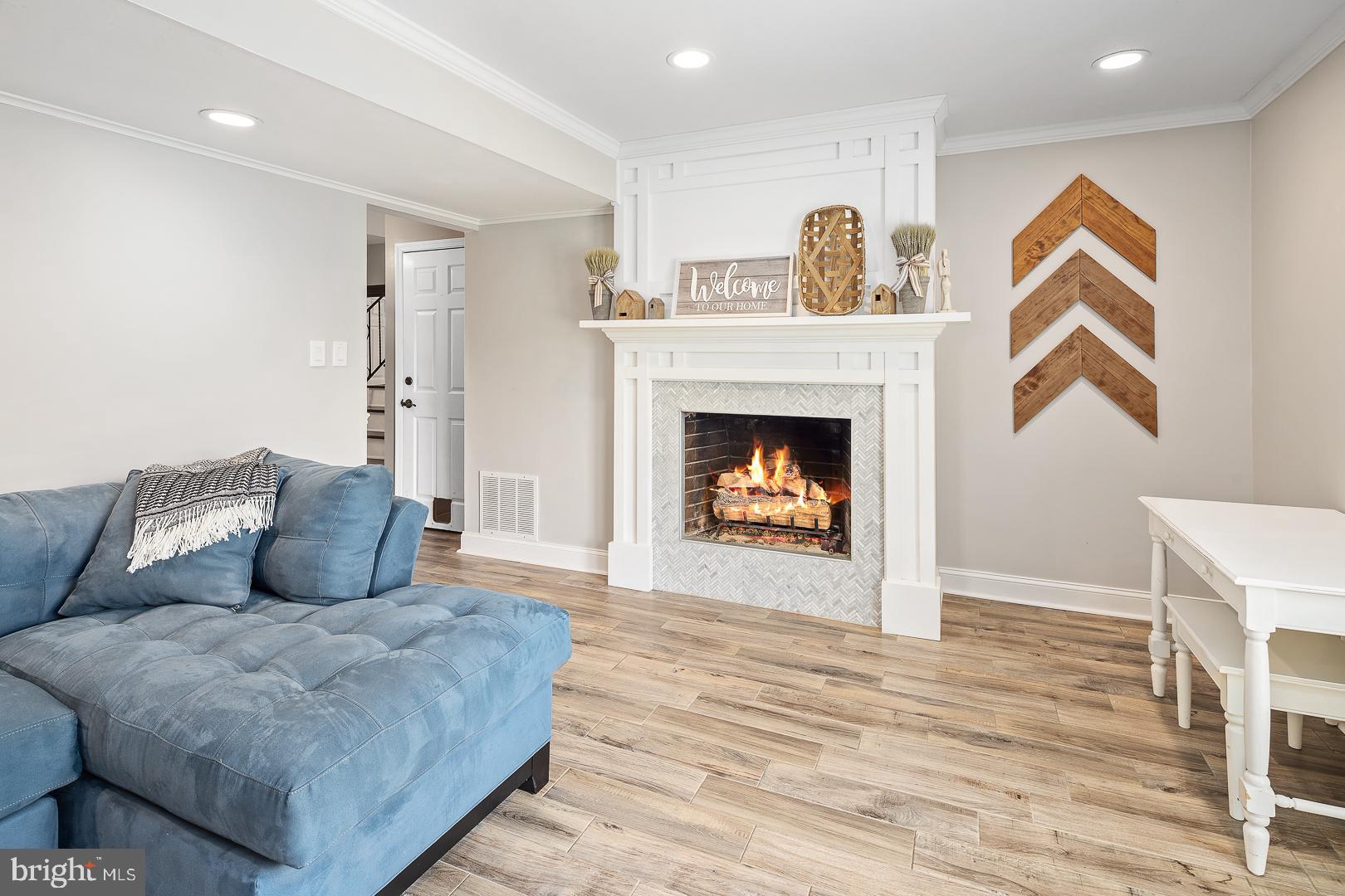 8 Valley Road Hamilton, NJ 08690 - Photo 21 of 31 a living room with furniture and a fireplace