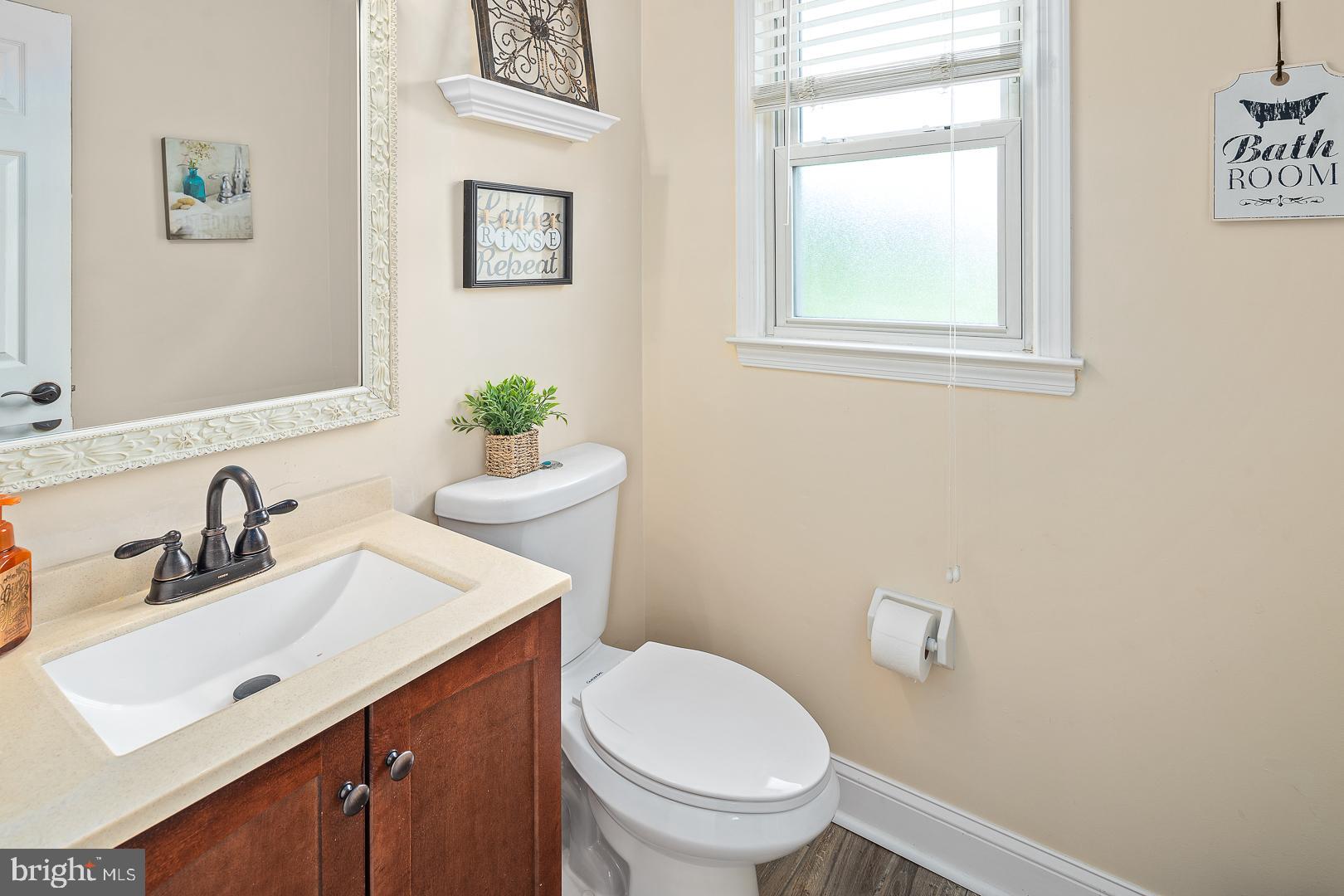 8 Valley Road Hamilton, NJ 08690 - Photo 23 of 31 a bathroom with a sink mirror and toilet