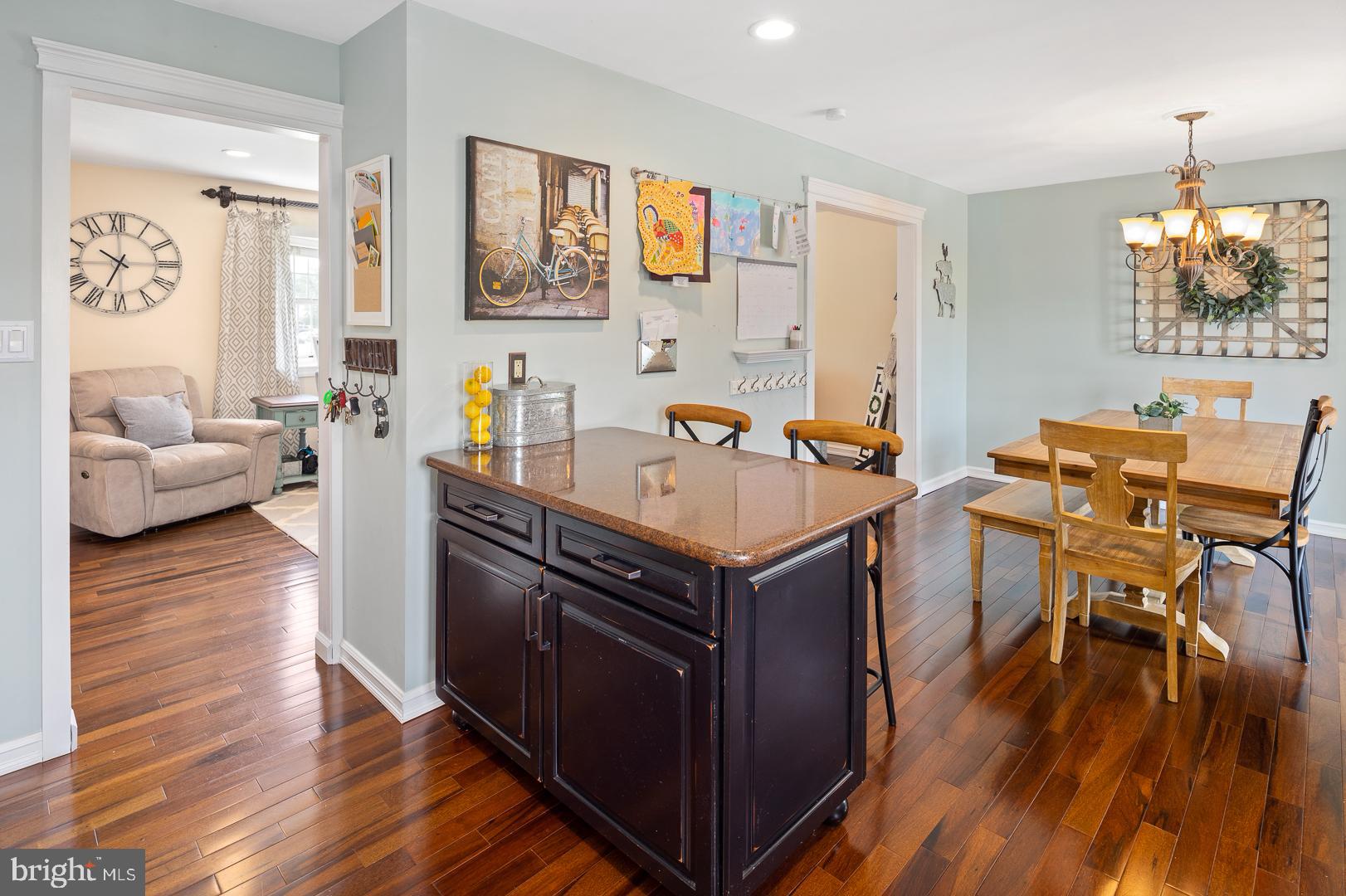 8 Valley Road Hamilton, NJ 08690 - Photo 10 of 31 a view of a kitchen area with furniture and wooden floor