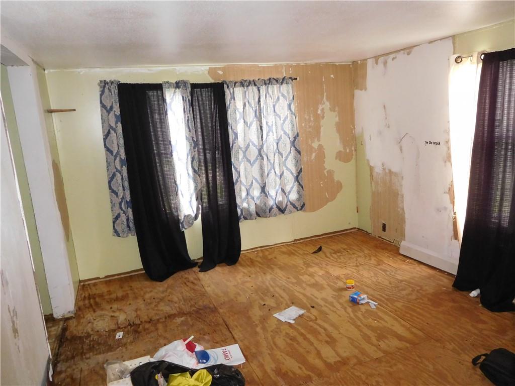 142 Ellis Road Southeast Rome, GA 30161 - Photo 11 of 19 a view of an empty room with a window