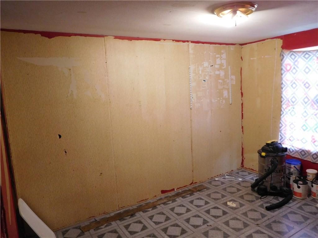 142 Ellis Road Southeast Rome, GA 30161 - Photo 16 of 19 a room with a bed and a dresser