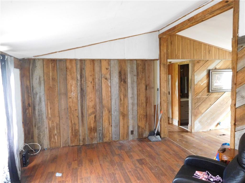 142 Ellis Road Southeast Rome, GA 30161 - Photo 6 of 19 a view of a room with wooden floor and stairs