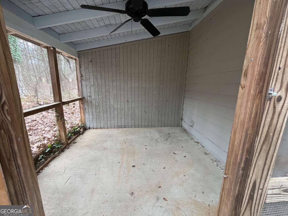 565 Rustwood Drive Athens, GA 30606 - Photo 13 of 16 a view of an empty room with a window
