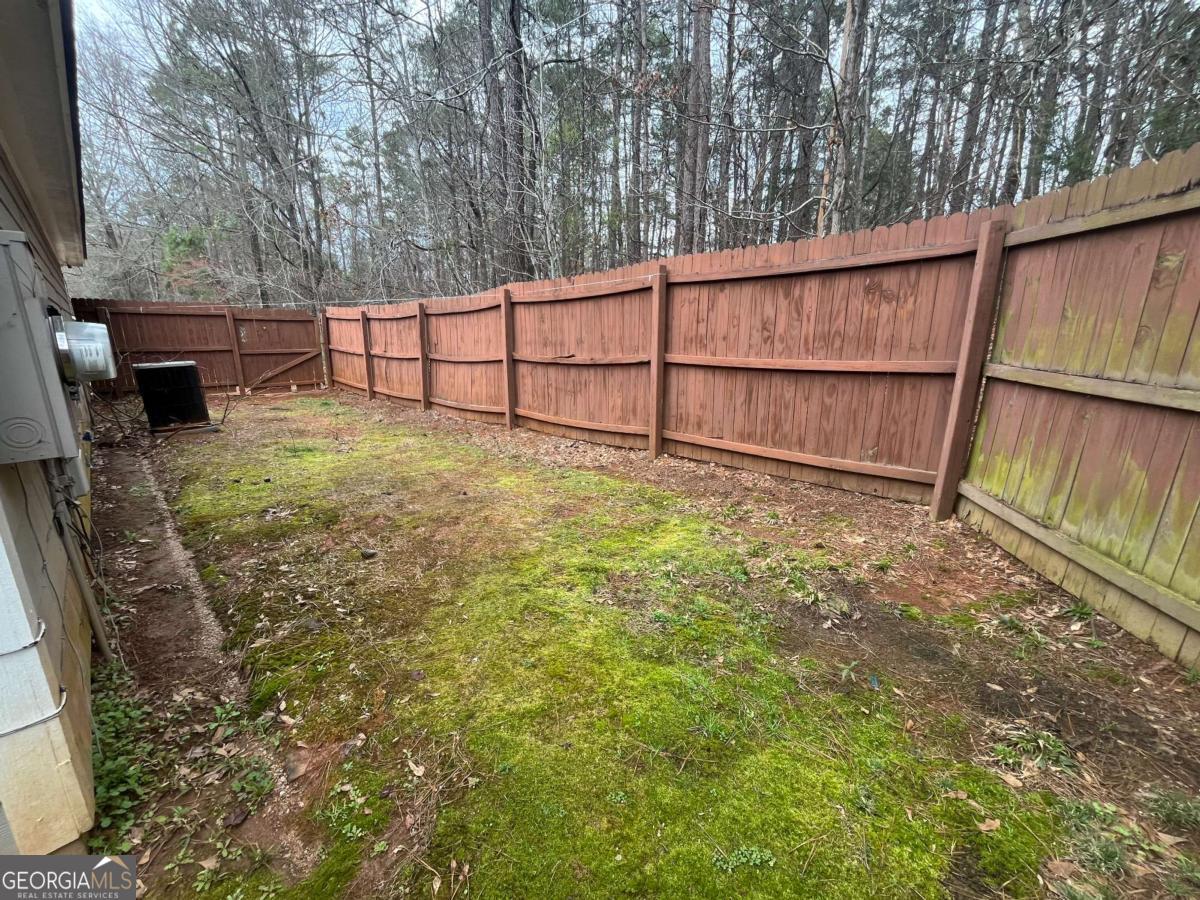 565 Rustwood Drive Athens, GA 30606 - Photo 15 of 16 a view of backyard with green space