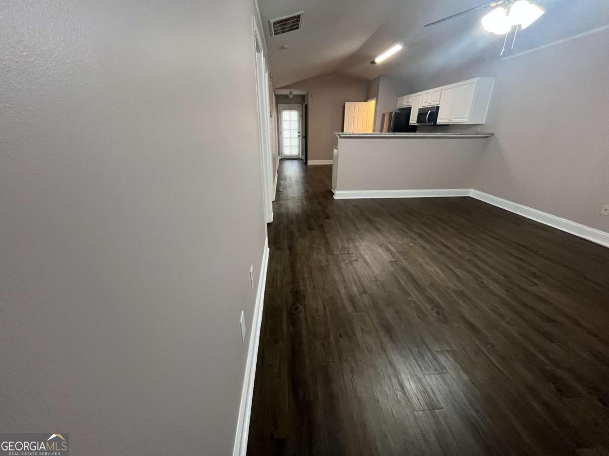 565 Rustwood Drive Athens, GA 30606 - Photo 5 of 16 a view of empty room with wooden floor