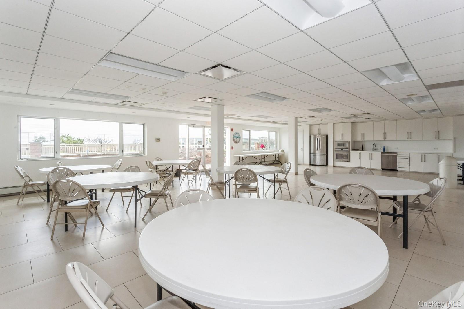830 Shore, Unit 2O Long Beach, NY 11561 - Photo 14 of 19 a very nice looking dining room with many windows