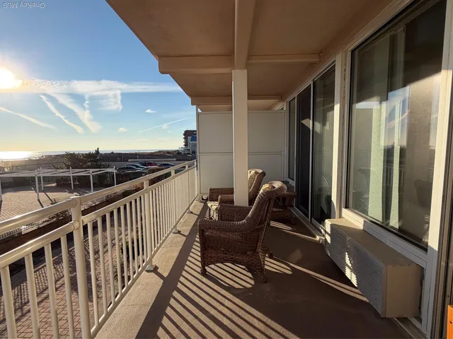 a view of a balcony with chair
