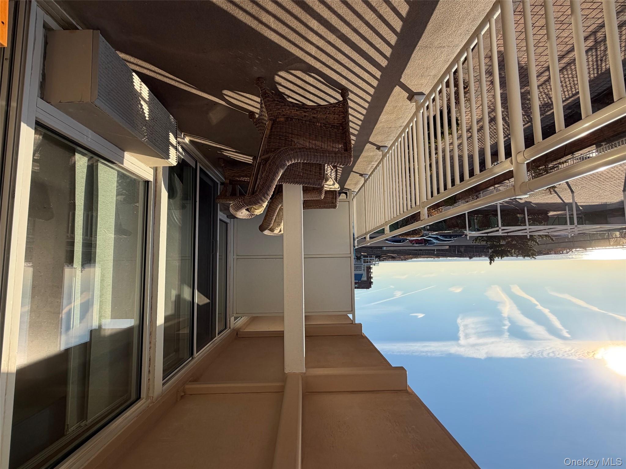 830 Shore, Unit 2O Long Beach, NY 11561 - Photo 17 of 19 a view of a balcony with chair