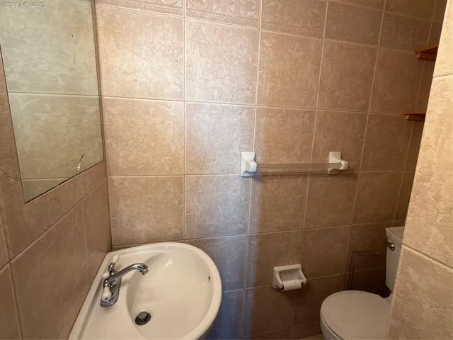 a bathroom with a sink and a toilet