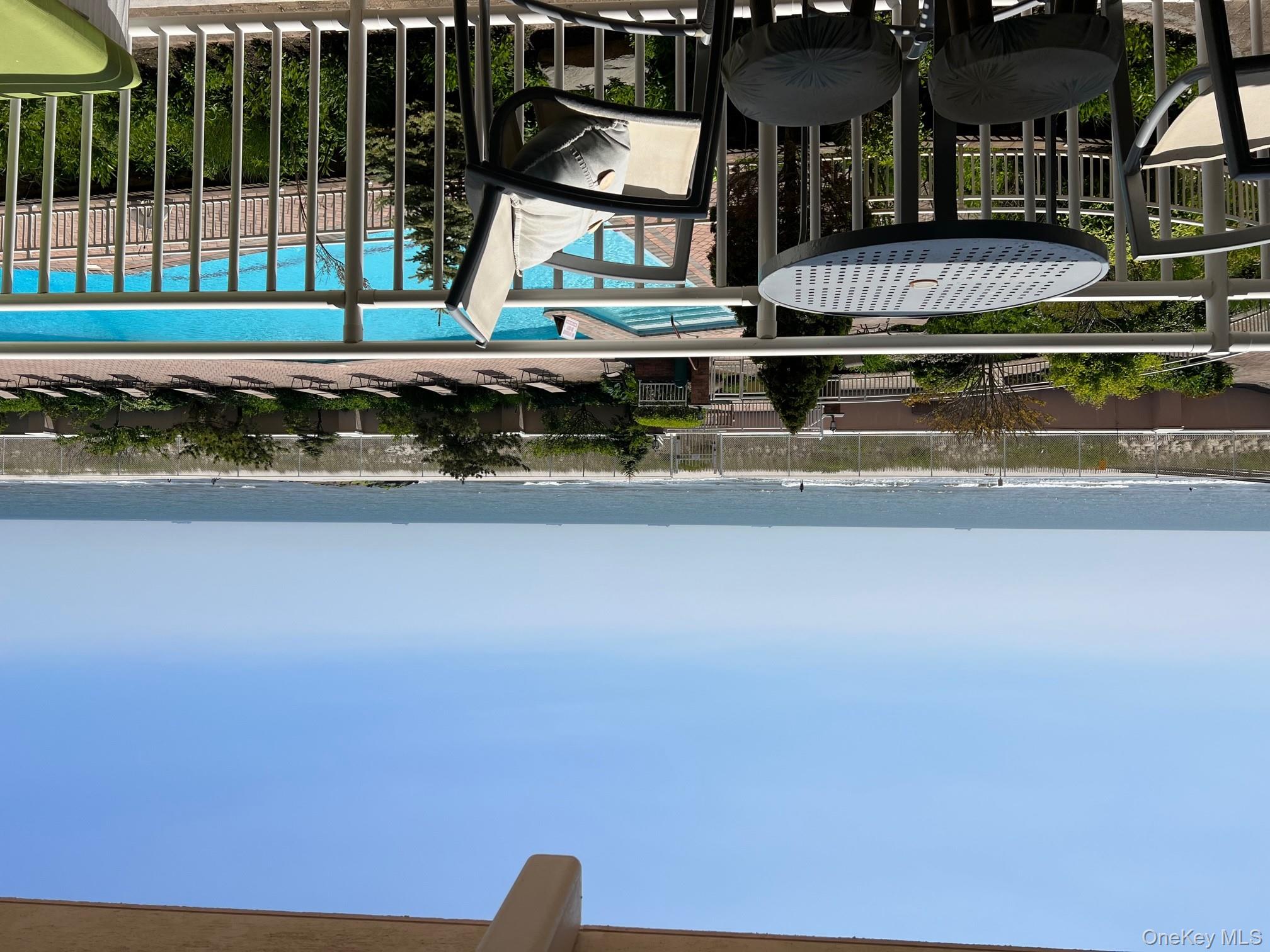 830 Shore, Unit 2O Long Beach, NY 11561 - Photo 10 of 19 a view of a chairs and table on the terrace