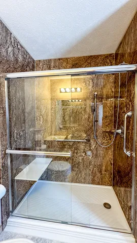 a room with gym equipment and a window