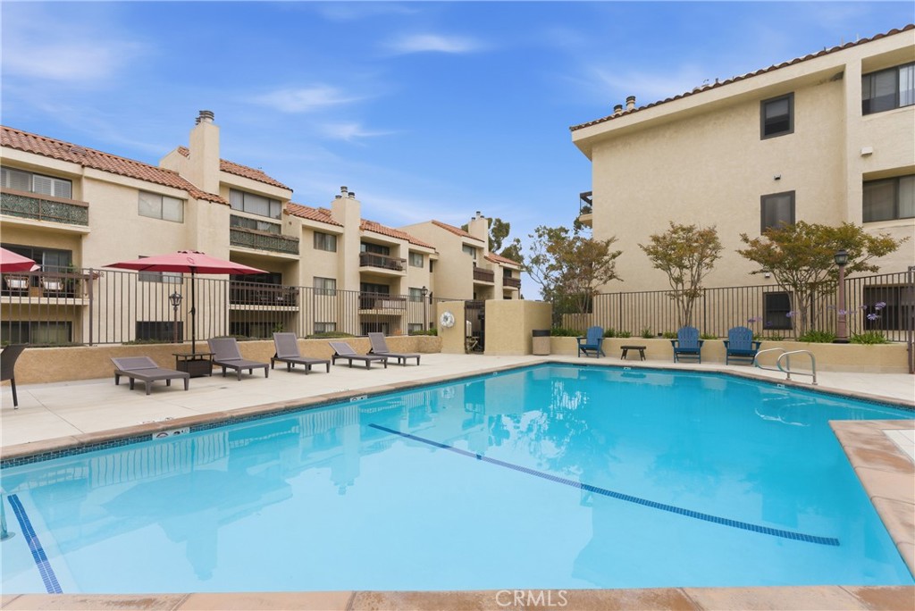 8180 Manitoba Street, Unit 330 Playa del Rey, CA 90293 - Photo 27 of 31 a view of a swimming pool with outdoor seating