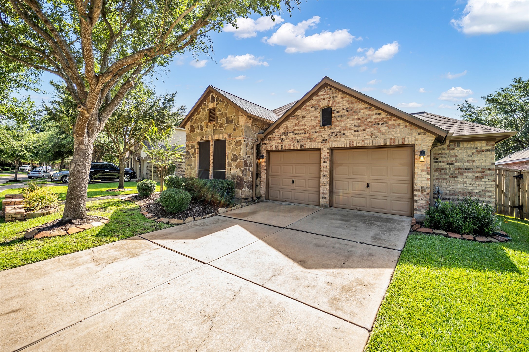 12006 Bayou Junction Road Cypress, TX 77433 - Photo 2 of 38 Welcome home! Don't miss the garage bump out on the side of the home - SO much extra storage space in the garge (which also has epoxy floors!)